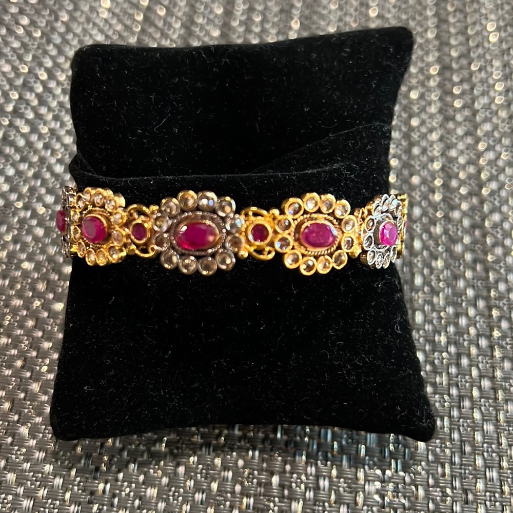 Gold plated bangle with stones